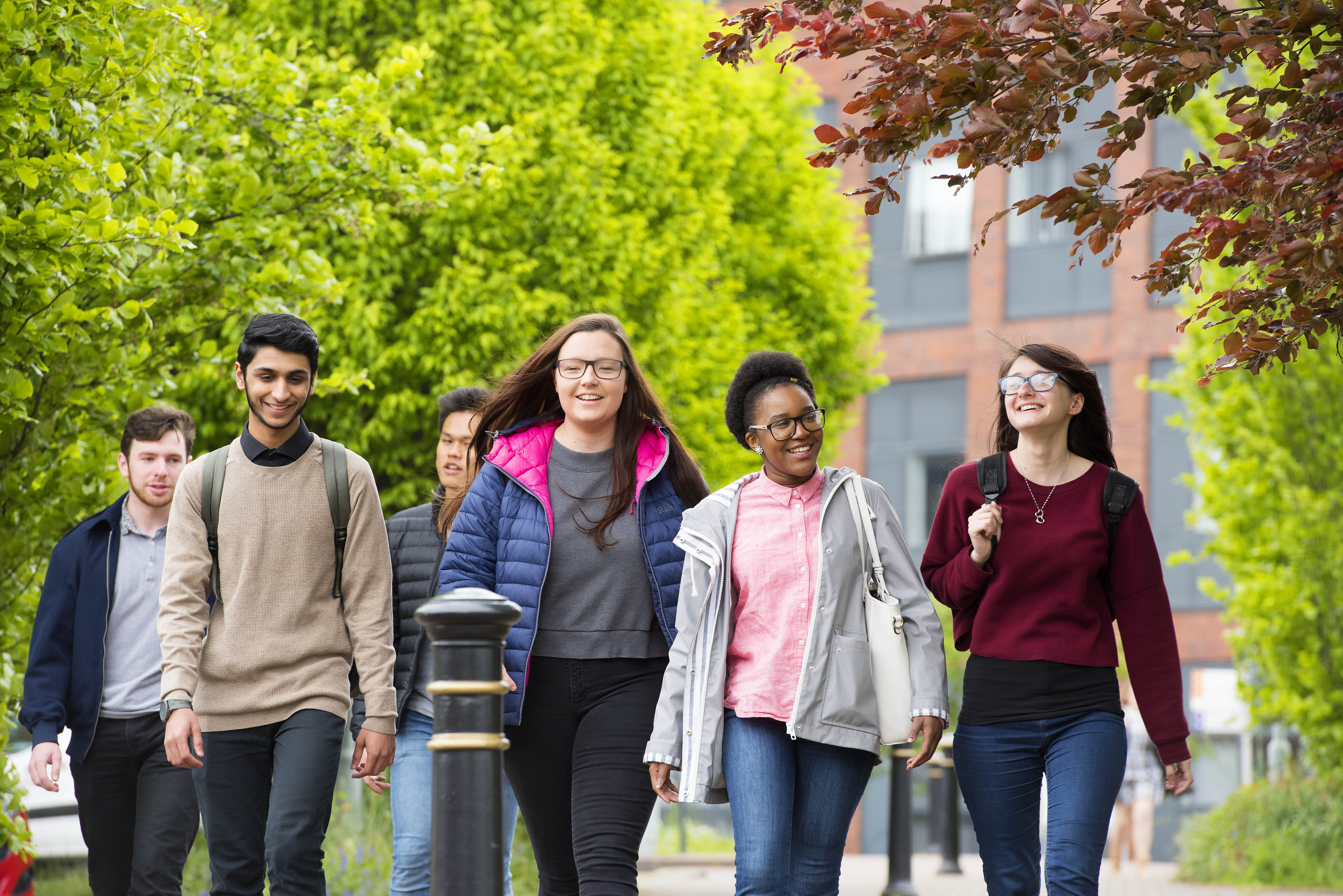 UCLan students walking through the Preston campus